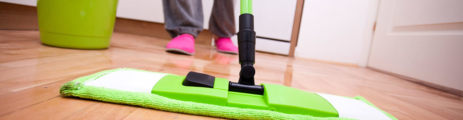 A person mopping the floor